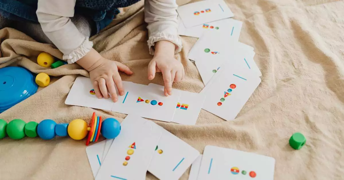 This image features toddlers busy in learning activities.