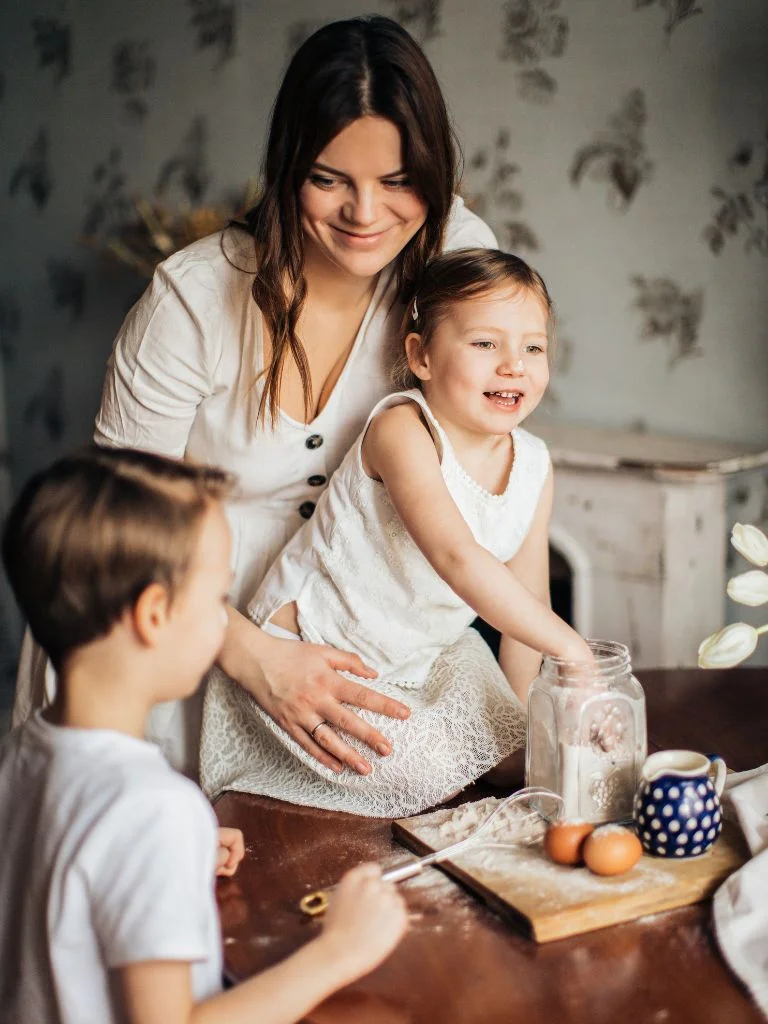 a mom playing with her two children