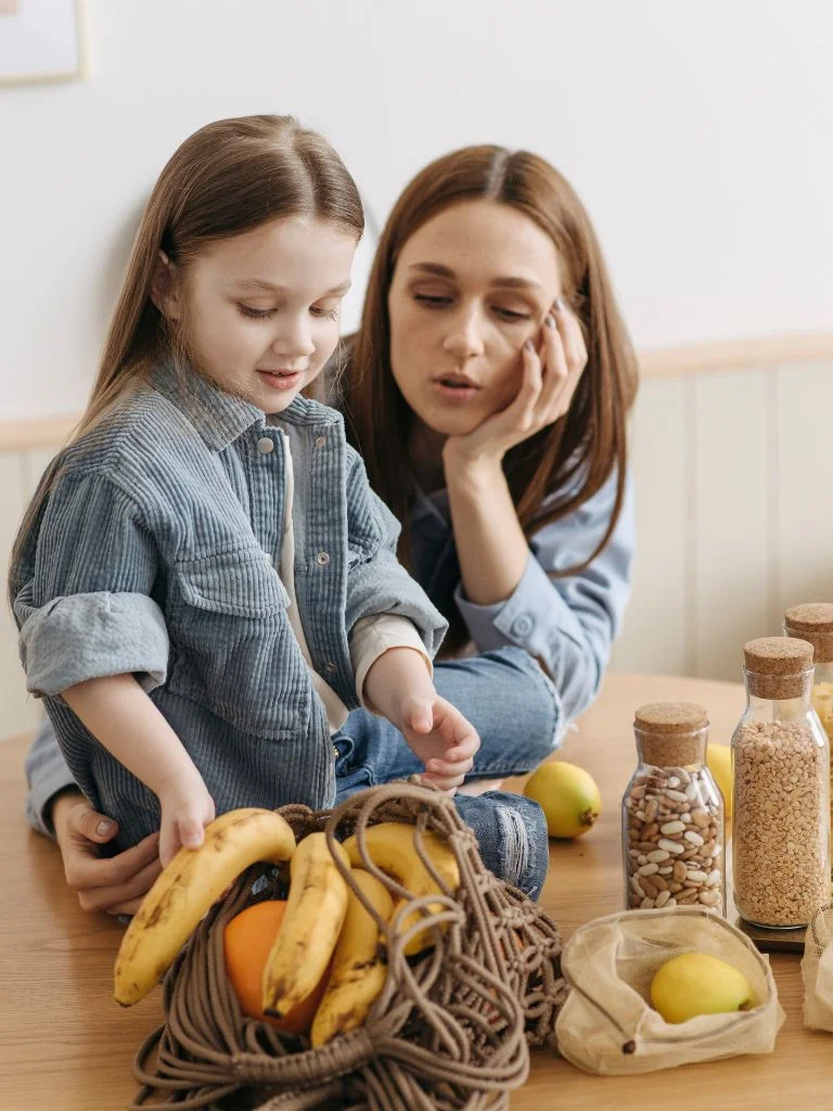 a toddler and a mom talking to each other