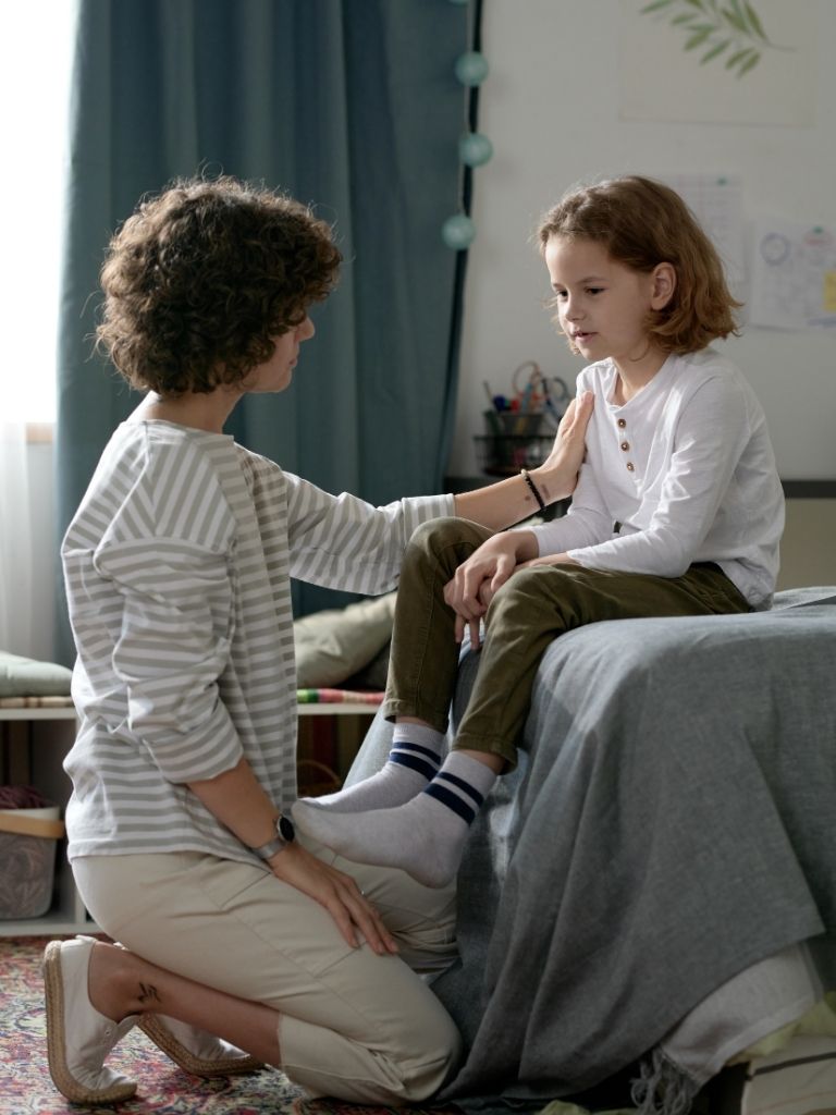 a mom and a daughter having a conversation eye to eye