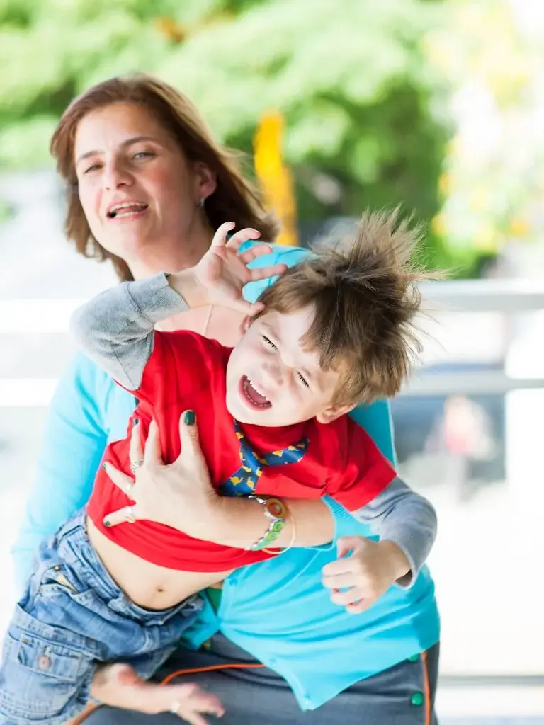 a mother handling a toddler tantrum