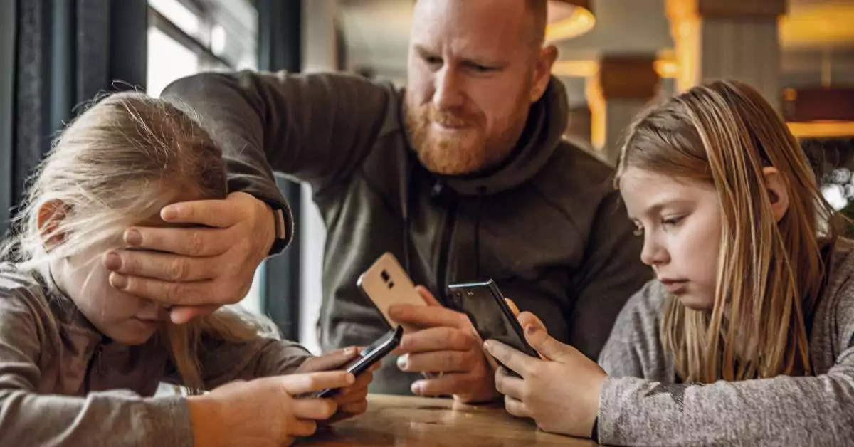 This image features a parent trying to limit screentime for the kids.