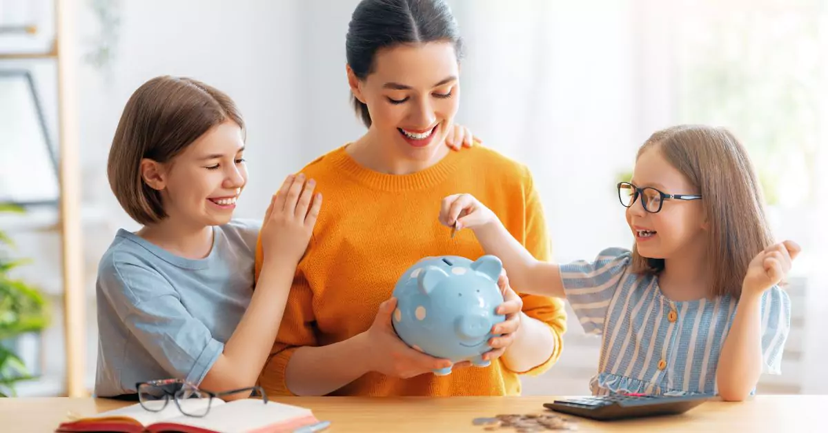 This image shows a single mom budgeting along with her kids.