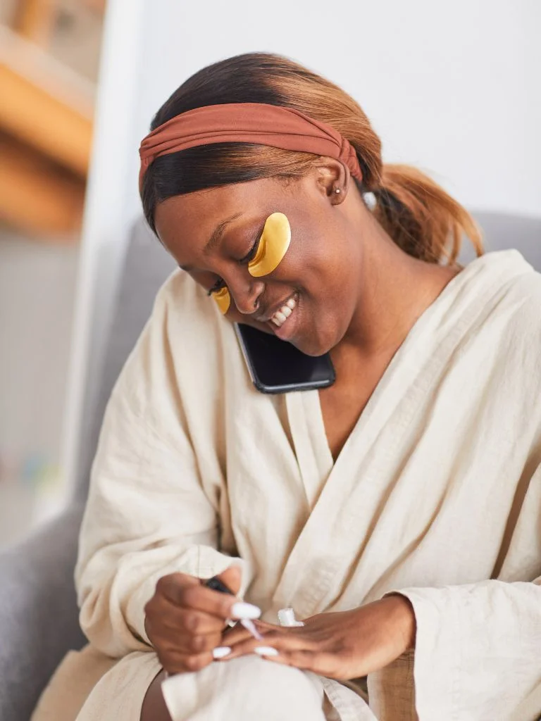 a shot of a woman pampering herself