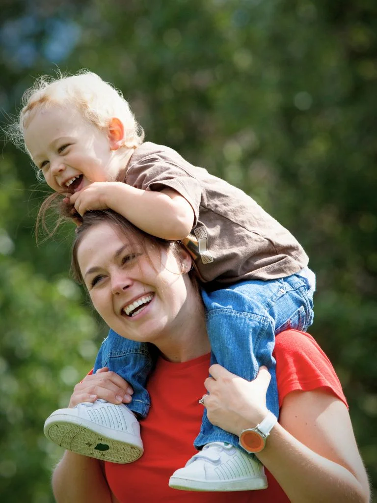 a mom and a toddler having fun together