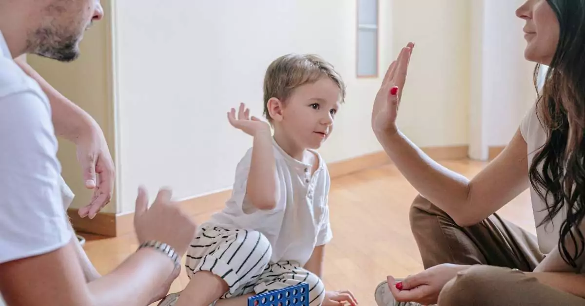 This image features parents raising emotionally mature children