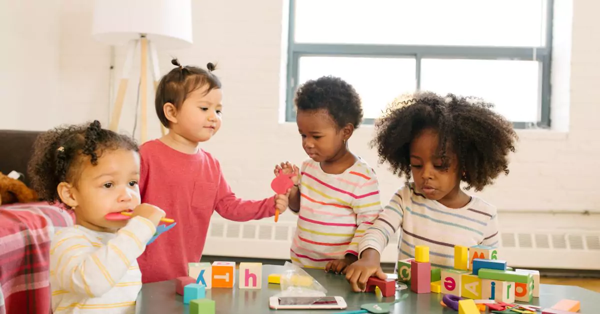 This is an image showing toddler doing learning activities.