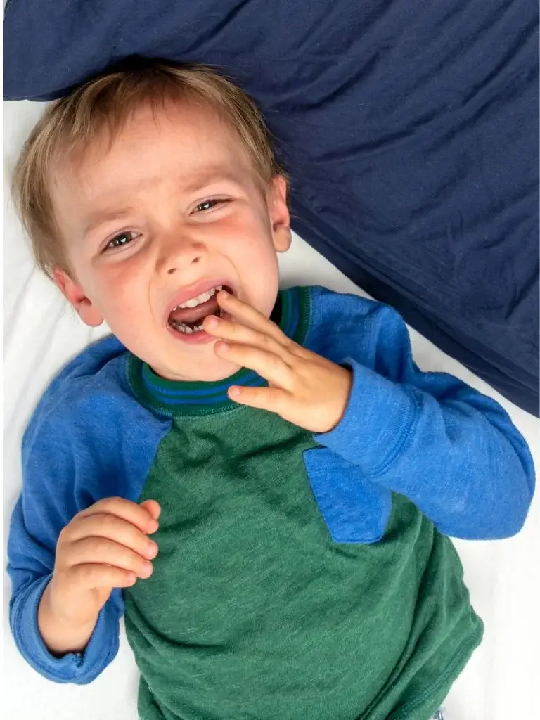 a toddler crying while in bed